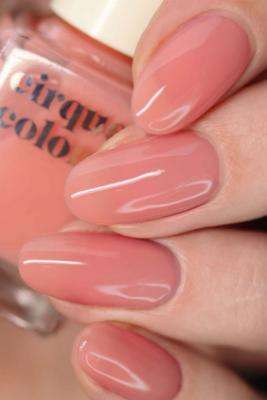 For a fun pop of color, try Soft Coral nail polish