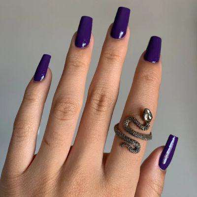 Opt for royal purple nail polish