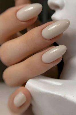 go for subtle beige nails