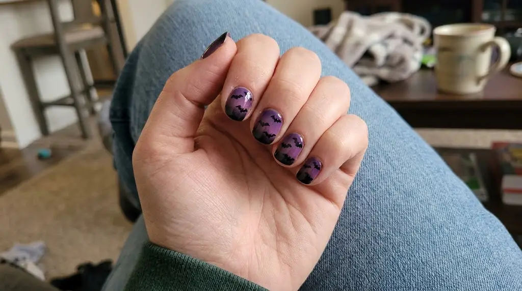 Bat Silhouettes over a Purple Dusk Sky Nails