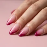 Almond shaped pink ombre French tip nails